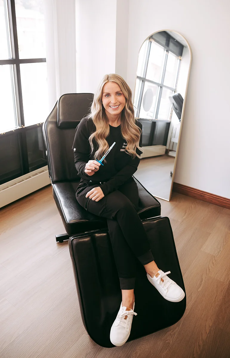 Brandy Bloom, FNP-BC sitting in her office chair